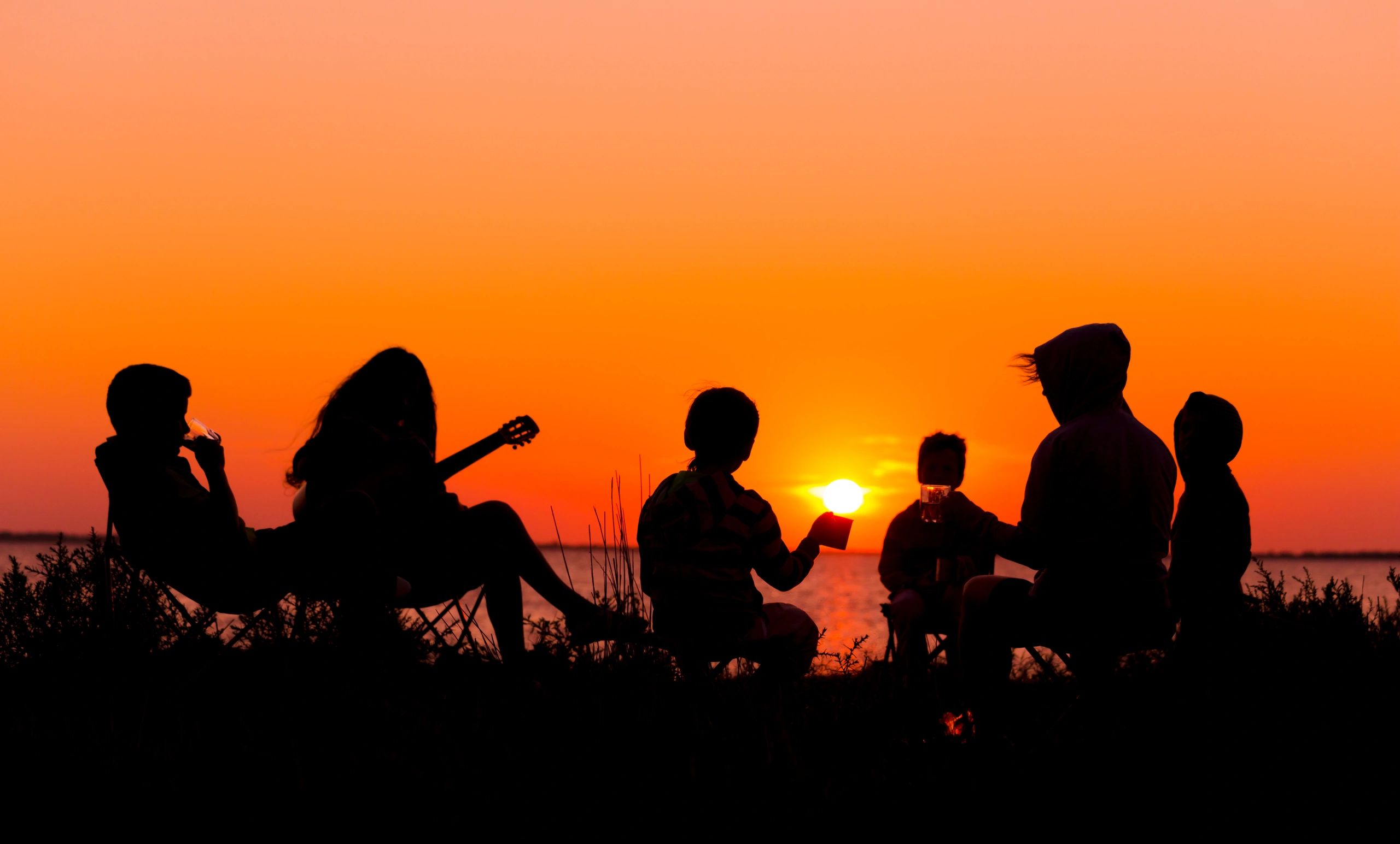 intentional gathering music culture sunset warm tones